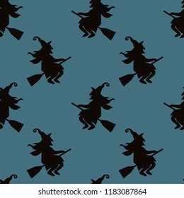 Abstract seamless halloween pattern for girls or boys. Creative vector background with cat, whitch, halloween. Funny pattern for textile and fabric. Fashion halloween style. Colorful bright picture
