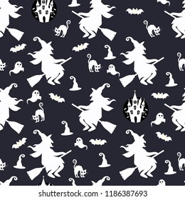 Abstract seamless halloween pattern for girls or boys. Creative vector background with cat, whitch, halloween. Funny pattern for textile and fabric. Fashion halloween style. Colorful bright picture