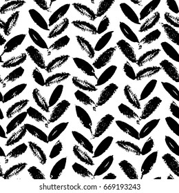 Abstract seamless hand drawn pattern. Modern grunge texture with botanical motif. Monochrome brush painted background.