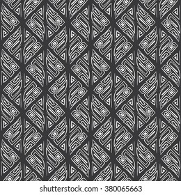 Abstract seamless hand drawn tribal white pattern on black background. Design element for background, textile, paper packaging and other. Vector illustration.