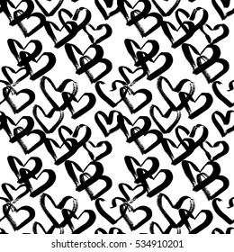 Abstract seamless heart pattern. Ink illustration. Black and white background.