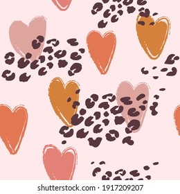 Abstract seamless hearts pattern. Valentines day wrapping paper with leopard skin print.