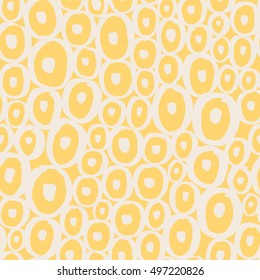 Abstract seamless Ink circles and dots pattern. Ink texture for your design. Monochrome yellow ink paint background.