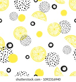 Abstract seamless lemon pattern in yellow and black color. Citrus Fruits and dots on white background.