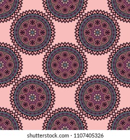 Abstract seamless mandala background. Texture in rose and lavender colors. Oriental pattern for design, fashion print, scrapbooking
