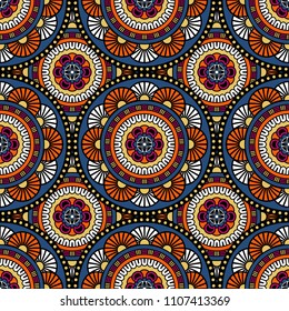 Abstract seamless mandala background. Texture in blue, yellow and white colors. Oriental pattern for design, fashion print, scrapbooking