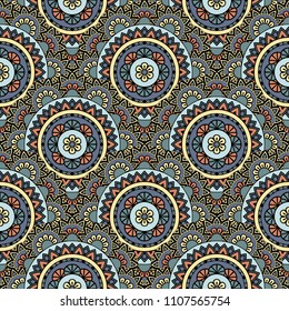 Abstract seamless mandala background. Texture in blue and red colors. Oriental pattern for design, fashion print, scrapbooking