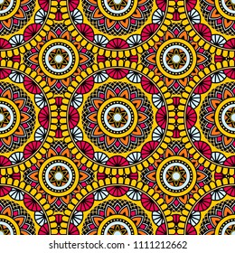 Abstract seamless mandala background. Texture in yellow, red and blue colors. Oriental pattern for design, fashion print, scrapbooking