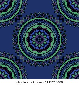 Abstract seamless mandala background. Texture in green and blue colors. Oriental pattern for design, fashion print, scrapbooking