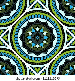 Abstract seamless mandala background. Texture in green and blue colors. Oriental pattern for design, fashion print, scrapbooking