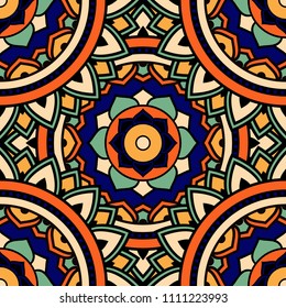 Abstract seamless mandala background. Texture in blue and yellow colors. Oriental pattern for design, fashion print, scrapbooking