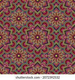Abstract seamless mandala background. Texture in pink, blue and yellow colors. Oriental pattern for design, fashion print, scrapbooking