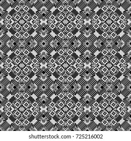 Abstract seamless modern pattern with regularly repeating geometrical grid with rhombuses, strips, rectangles in gray, black and white colors. Vector element for graphical design.