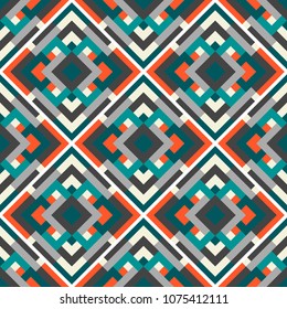 Abstract seamless multicolor pattern. Vector geometric background  in orange, blue and gray colors. Mosaic texture for textile, clown, carpeting, warp, book cover, clothes. Tile backdrop