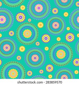 Abstract Seamless multicolored geometric floral pattern of dots.Vector illustration