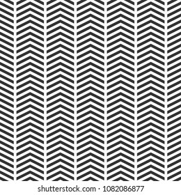 Abstract seamless pattern of arrows. Rhythmic structure of herringbone. Monochrome stylish texture with chevron. Vector geometric background.