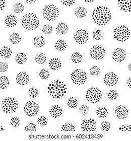 Abstract seamless pattern background with dots. Big black rounds with small circles inside on white background. Monochrome. Design soft wrapping, fabric, textile, gift paper. Memphis style 