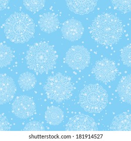Abstract seamless pattern background with symbolical white snowflakes and circles on blue. Vector