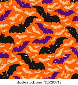 Abstract seamless pattern with bats. Background for Halloween party. Vector illustration