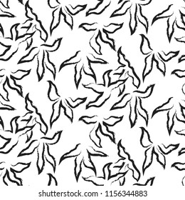 Abstract seamless pattern of black brush strokes of ink