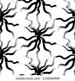 Abstract seamless pattern of black brush strokes of ink