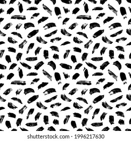 Abstract seamless pattern with black brush strokes. Grunge textures. Chaotic elements, spots, blots. Vector illustration may be used for textile, fabric, wrapping paper, wallpaper, design.