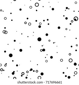 Abstract seamless pattern with black chaotic small circles, rings on white. Infinity messy geometric pattern. Vector illustration. 