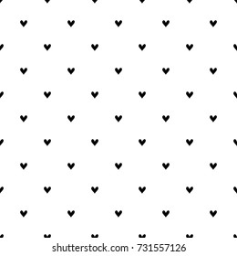 abstract seamless pattern with black hearts.