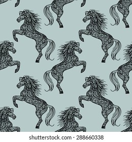 Abstract seamless pattern with black horses silhouettes on gray background.  Animal texture drawn in vector.