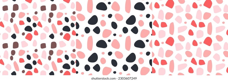Resumen de un patrón sin fisuras con manchas negras y rosas. Establecer. Ilustración del doodle vectorial sobre fondo blanco. manchas para tejidos, textiles y etc.