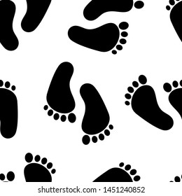 Abstract seamless pattern with black traces of human feet. Footprint isolated on white background. Vector illustration