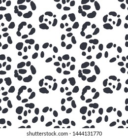 Abstract seamless pattern of black and white jaguar skin. Repeating texture. Figure for textiles. Surface design.