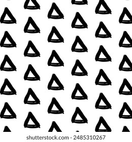 Abstract seamless pattern with black and white grungy triangles in vertical symmetrical alignment. Hand-drawn brushstrokes. Ideal for wrapping paper, banners, cards, textiles