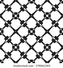 Abstract seamless pattern in black and white.Flat design.Black lace on a white background.Black and white graphics.Art nouveau.For decorating fabric, paper, Wallpaper, and packaging.