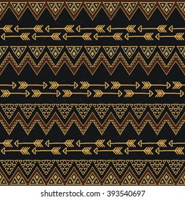 Abstract seamless pattern in boho chic style. Hand drawn hipster background with aztec motives.