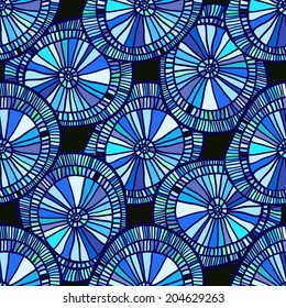 Abstract seamless pattern. Bright multicolored wheels and circles on a black background. Painted hands, vector.