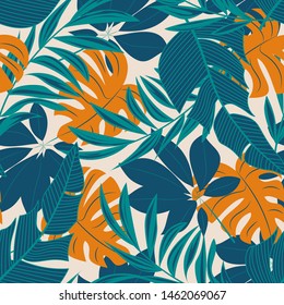 Abstract seamless pattern with bright tropical leaves and plants on a delicate background. Vector design. Jungle print. Floral background. Printing and textiles. Exotic tropics. Summer design.