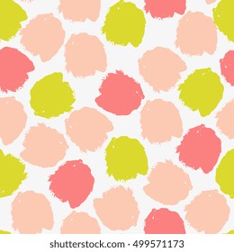 Abstract seamless pattern with brush strokes in green, peach and pink.