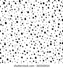 Abstract seamless pattern. Casual polka dot wallpaper design element.Monochrome hand drawn texture