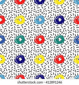 Abstract seamless pattern with circle brushstrokes. Vector illustration. Retro fashion design in 80s - 90s style. Hand painted in blue, yellow, red colors