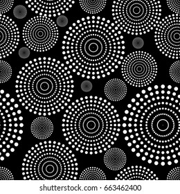 Abstract seamless pattern, circles of dots, texture white on black, fireworks in the sky. Vector illustration.