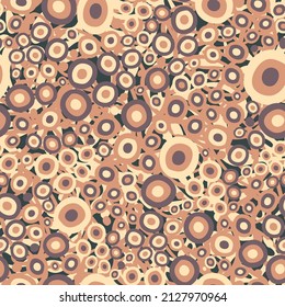 Abstract seamless pattern with circles and floral motifs.