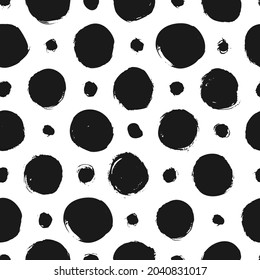 Abstract seamless pattern with circles. Geometry black and white vector pattern for fabric. Textile grunge background. Hand drawn polka dot texture. Modern graphic design with different circles.