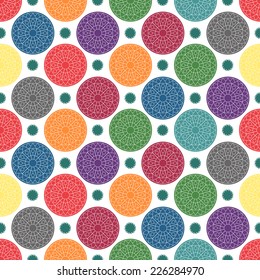 Abstract seamless pattern with colored circles.