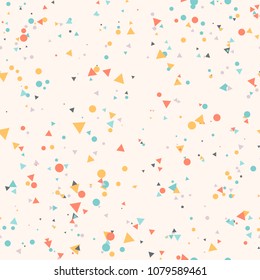 Abstract seamless pattern with colorful blue, gray, yellow, orange chaotic small circles and triangles on beige. Infinity geometric pattern. Vector illustration.  