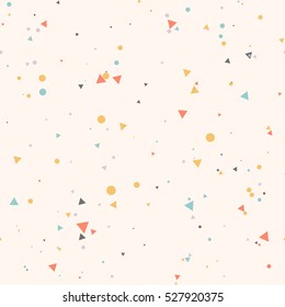 Abstract seamless pattern with colorful blue, gray, yellow, orange chaotic small circles and triangles on beige. Infinity geometric pattern. Vector illustration.  