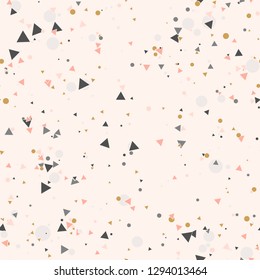 Abstract seamless pattern with colorful chaotic small circles and triangles on beige. Infinity geometric pattern. Vector illustration.    