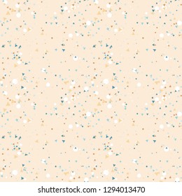 Abstract seamless pattern with colorful chaotic small circles and triangles on beige. Infinity geometric pattern. Vector illustration.    