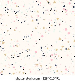 Abstract seamless pattern with colorful chaotic small circles and triangles on beige. Infinity geometric pattern. Vector illustration.    