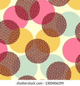 Abstract seamless pattern of colorful circles and textured circles.